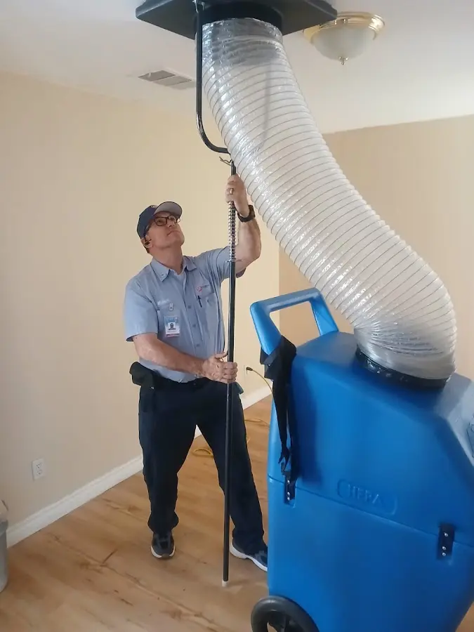 HVAC Installation technician using HEPA equipment in Atascocita